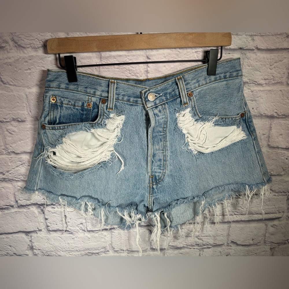 Women’s size 28 distressed ripped denim Levi’s 501 Jean Shorts